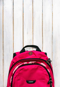 High angle view of pink umbrella on wall