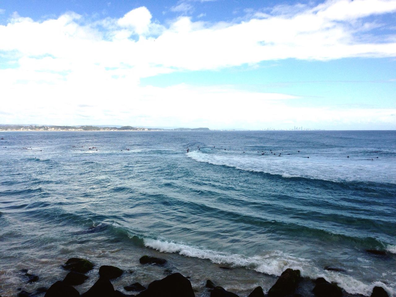 sea, horizon over water, water, sky, scenics, tranquil scene, beauty in nature, beach, tranquility, shore, wave, cloud - sky, nature, blue, idyllic, cloud, seascape, surf, coastline, rock - object