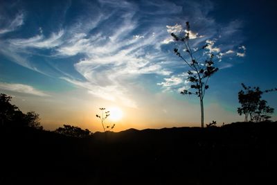 Scenic view of silhouette landscape against sky during sunset