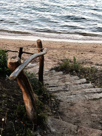 High angle view of wooden post on beach