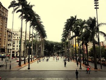 Group of people walking on road