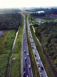 High angle view of road amidst landscape against sky