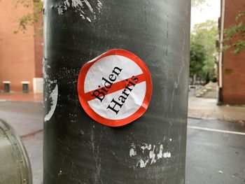 Close-up of road sign on street