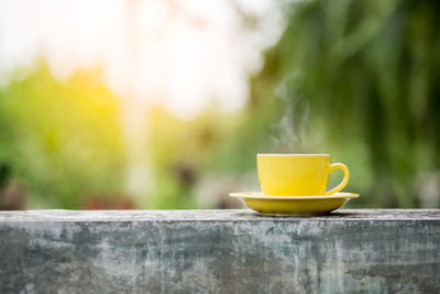 Close-up of coffee cup on table