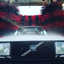 Close-up of text on car windshield