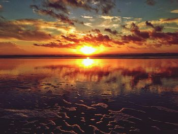 Scenic view of sunset over river