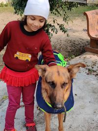 Portrait of girl with dog
