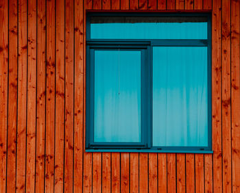 Closed blue door of building