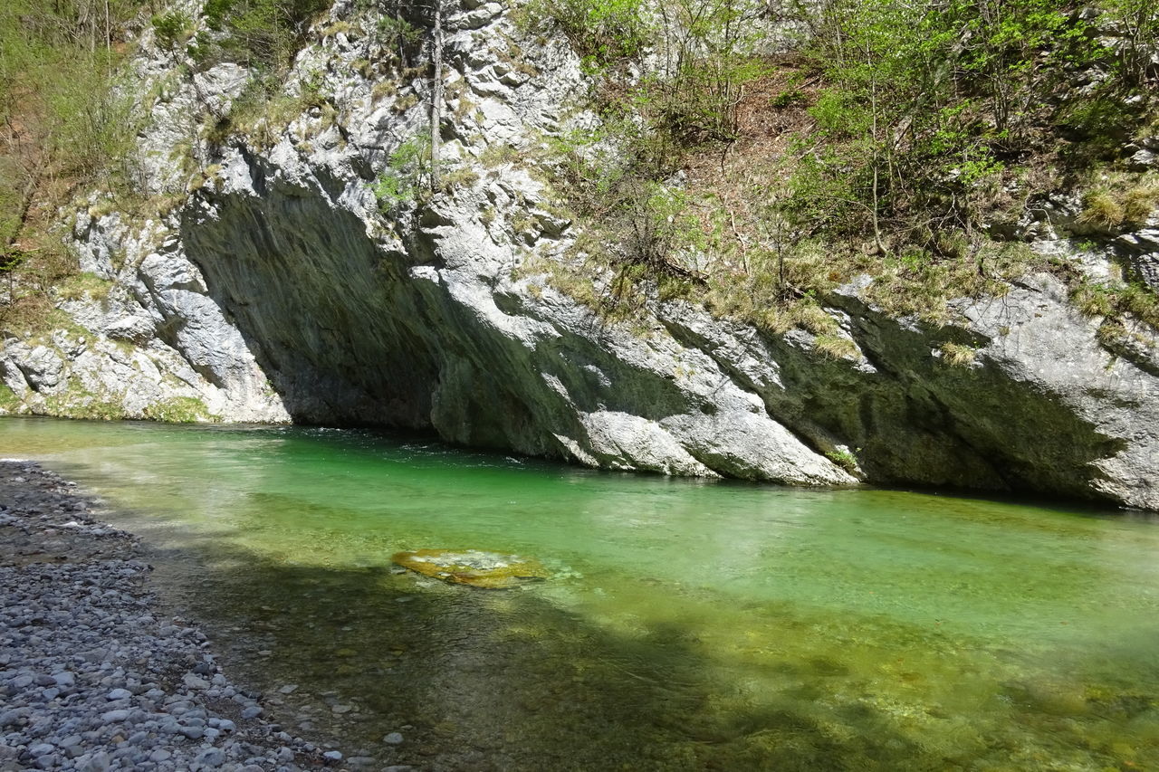 SCENIC VIEW OF RIVER AMIDST ROCK FORMATIONS