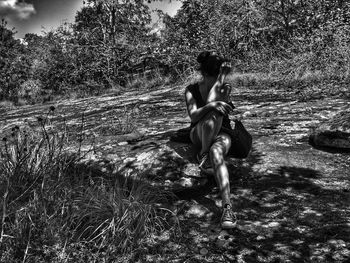 Full length of woman standing on field