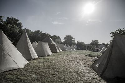 Panoramic view of tent on field against sky