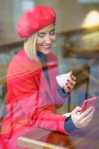 Young woman using mobile phone