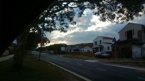 Road with buildings in background