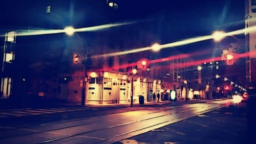 Illuminated street light at night