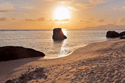 Scenic view of sunset over sea