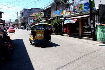 Jinrikisha on city street