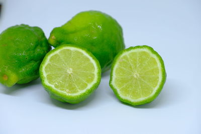 Close-up of green fruits on table