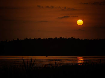 Majestic sunset over tranquil lake in russia