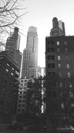 Low angle view of skyscrapers against sky