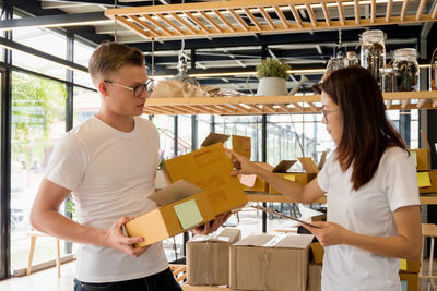 Young colleagues working at office