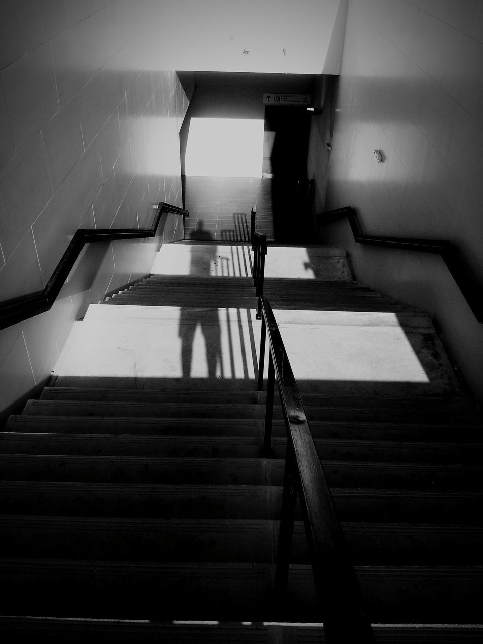 steps, steps and staircases, low angle view, staircase, indoors, railing, built structure, architecture, building exterior, escalator, building, technology, no people, day, metal, high angle view, stairs, window, wall - building feature