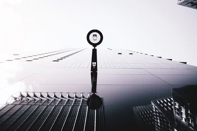 Reflection of buildings on glass structure