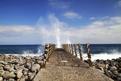 Waves breaking on shore