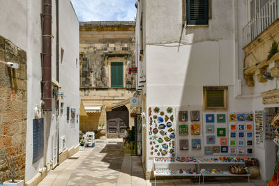 A narrow street among the old houses in the historic center of otranto, a town in puglia in italy.