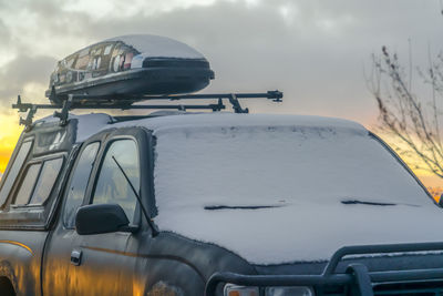 Close-up of car against sky