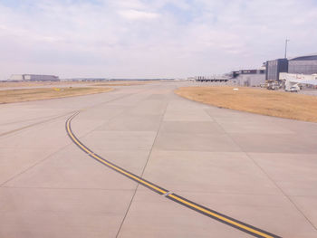 View of airport runway against sky