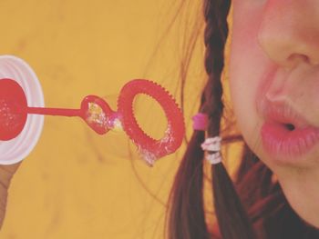 Close-up of woman holding ice cream