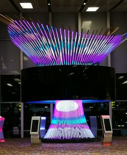 Multi colored illuminated stage at night