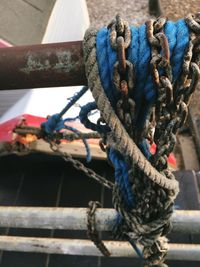 High angle view of boat moored on railing