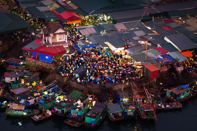 High angle view of illuminated market at night