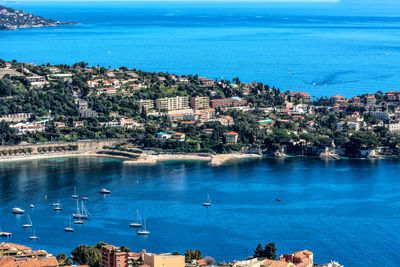 High angle view of town by sea