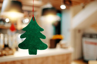 Close-up of christmas decoration hanging on tree