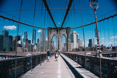 View of suspension bridge in city