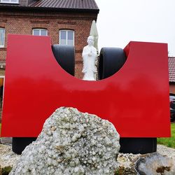 Low angle view of statue against building