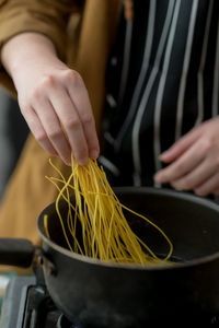 Close-up of person preparing food