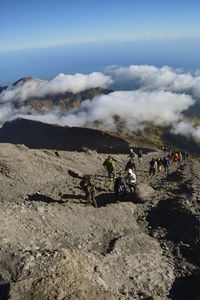 Group of people on mountain road