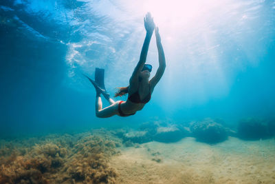 Man swimming in sea