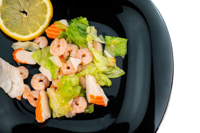 High angle view of chopped fruits in bowl