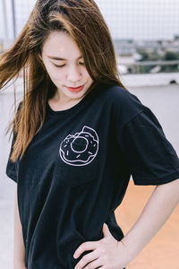 Close-up of teenage girl standing outdoors