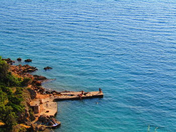 High angle view of sea and rocks