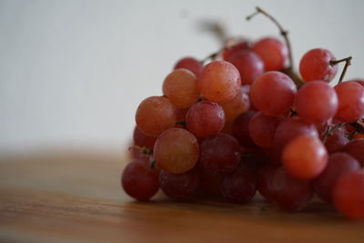 Close-up of grapes on table