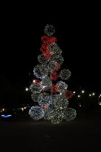 Illuminated christmas tree at night