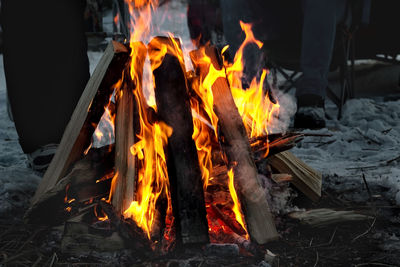 Close-up of bonfire on fire at night