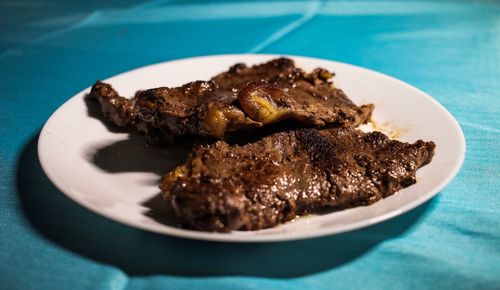 Close-up of meat in plate on table