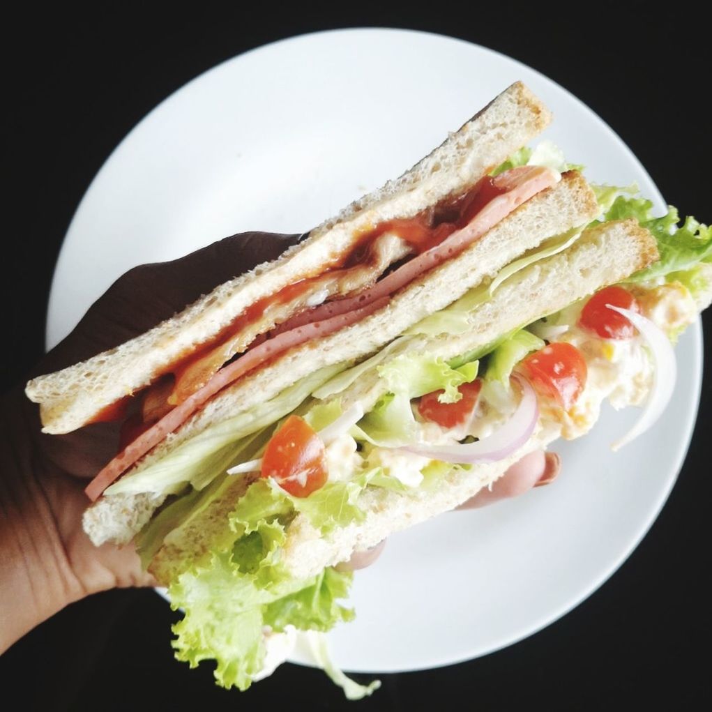 food, ready-to-eat, food and drink, bread, sandwich, healthy eating, plate, freshness, indoors, close-up, vegetable, wellbeing, meal, fruit, human body part, one person, hand, meat, lettuce, tomato, snack