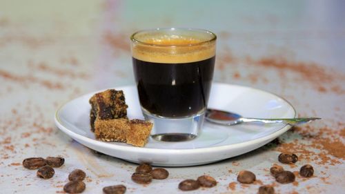 Close-up of coffee in cup on table